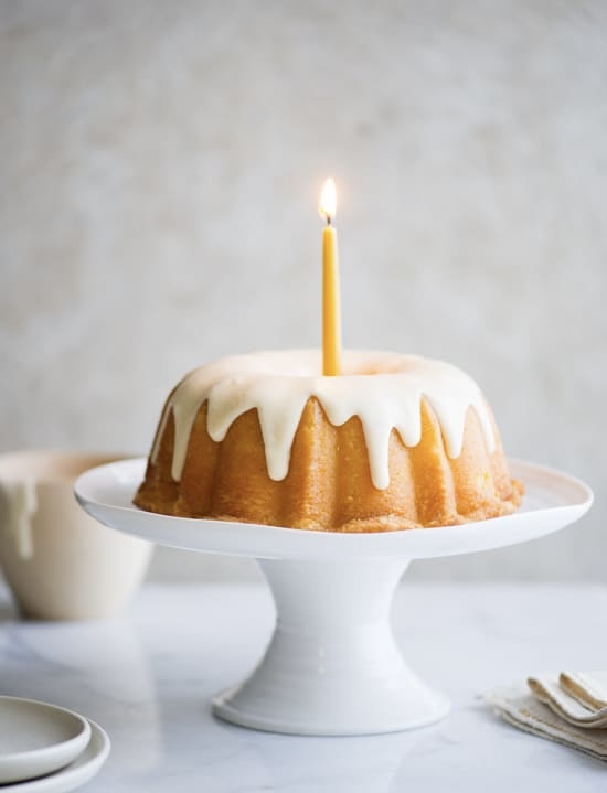 bundt cake with a candle lit