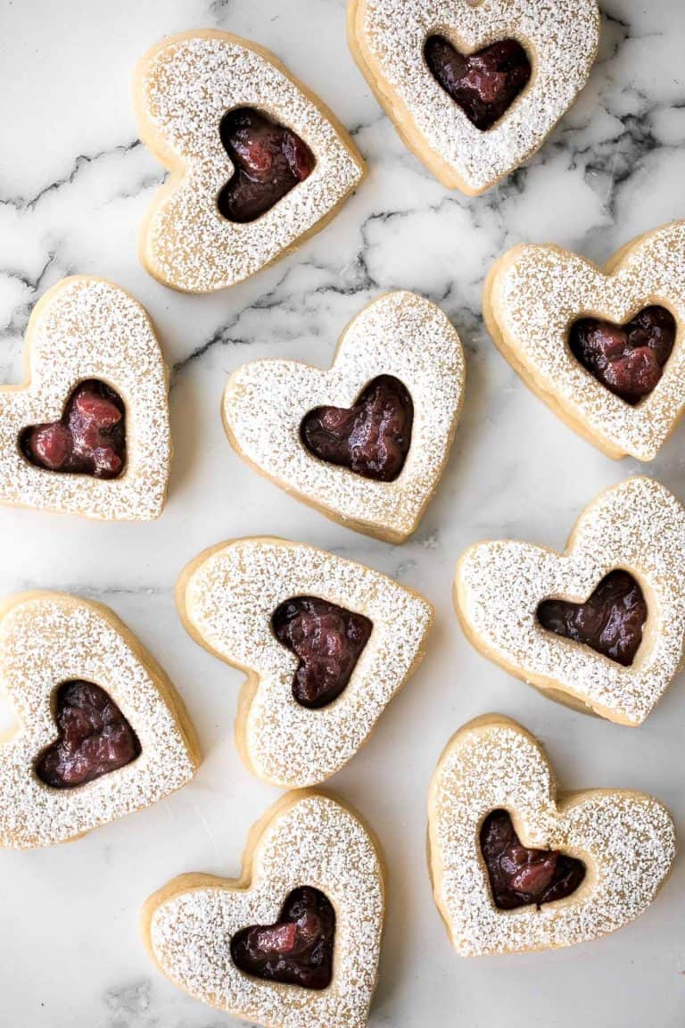 Heart shaped linzer cookies filled with jam